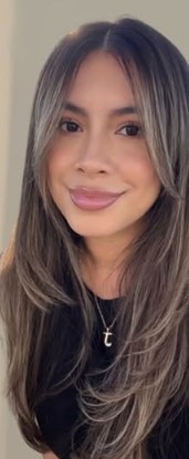 Diana, stylist at Evolve Salon, specializing in custom lived-in color, layered haircuts & blowouts