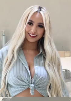 Vee, stylist at Evolve Salon, specializing in blondes & hair extensions
